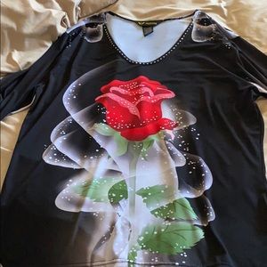 Rose on black top